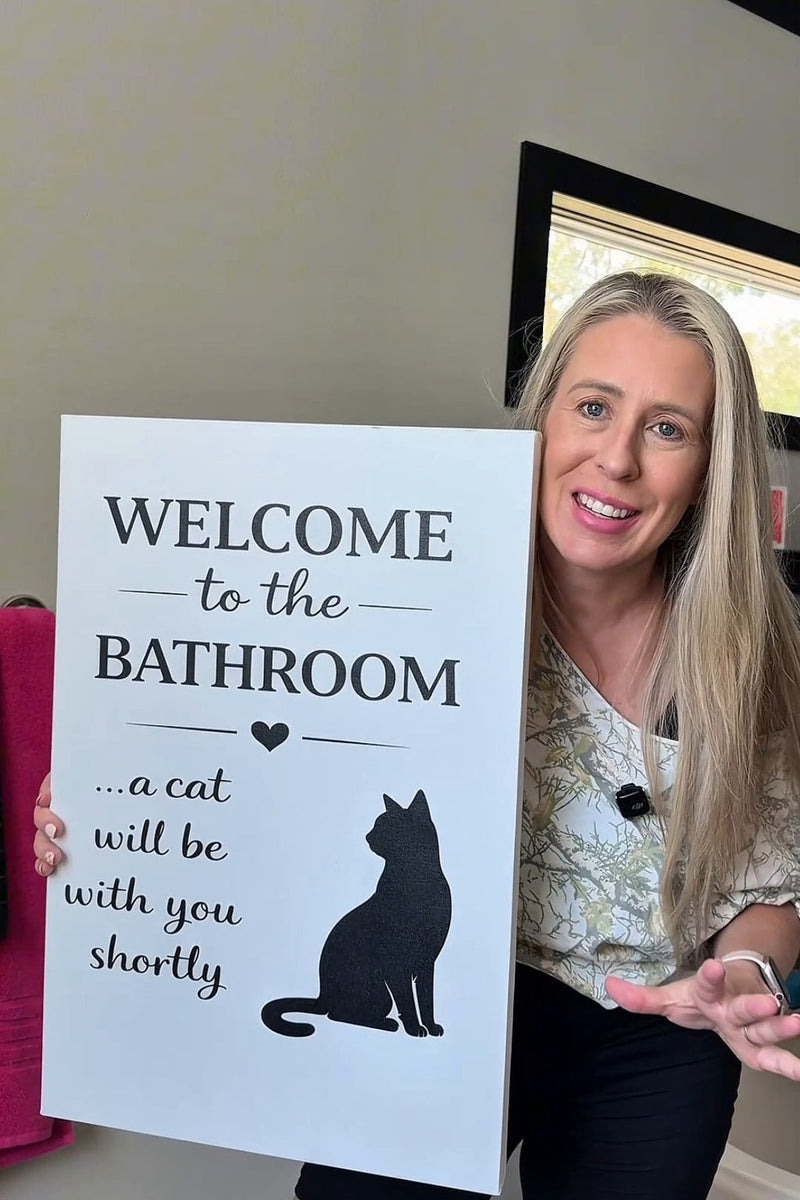 Funny cat bathroom canvas held by a cat mom, a Christmas gift for cat lovers