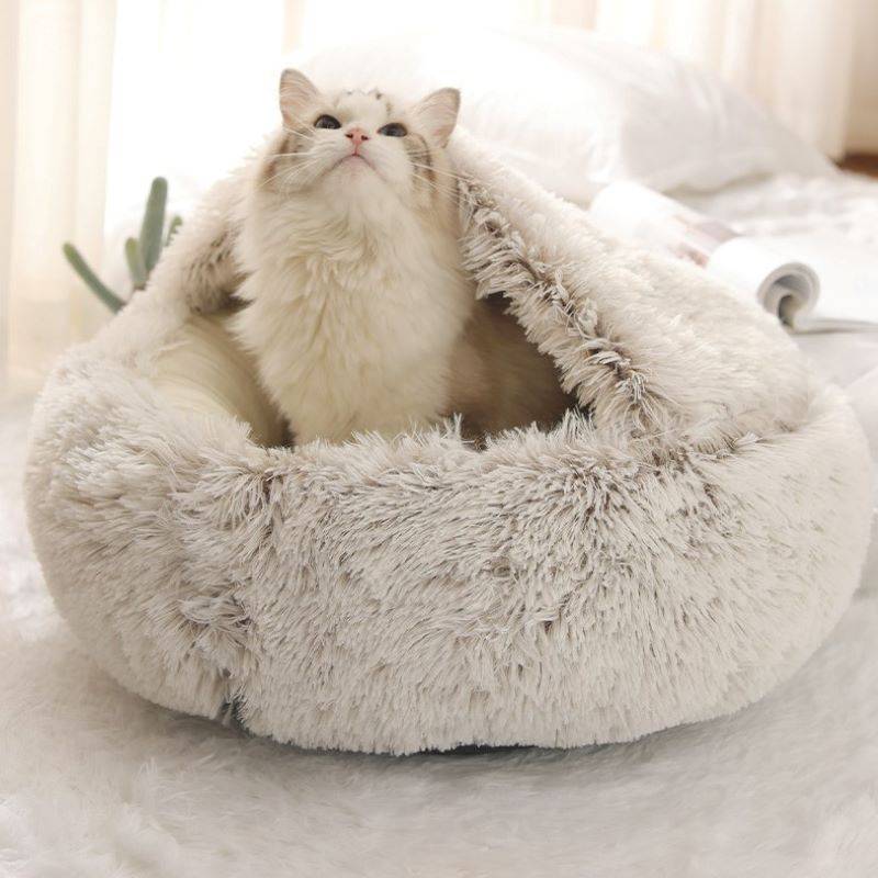 Plush fluffy pet bed with raised rim and hood for cats