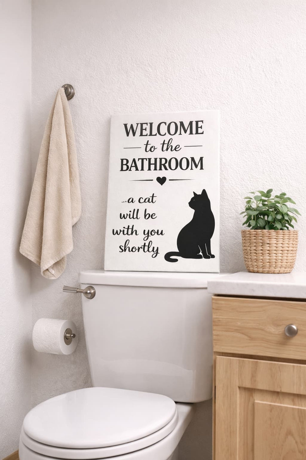 Cat bathroom wall art canvas shown in a home bathroom