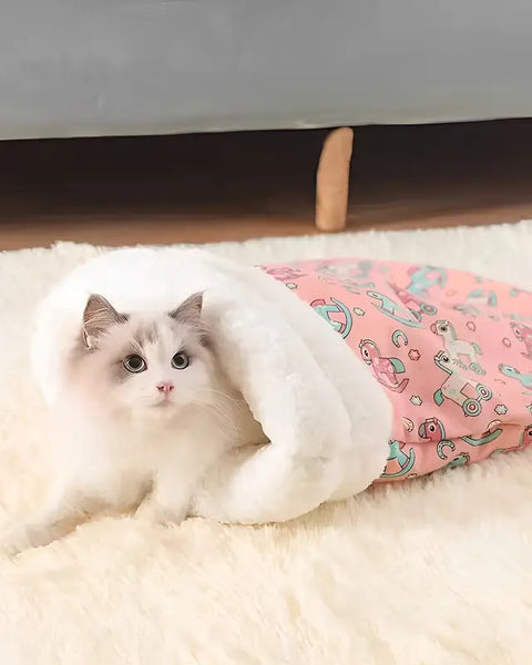 Cat resting inside the plush cat sleeping pouch