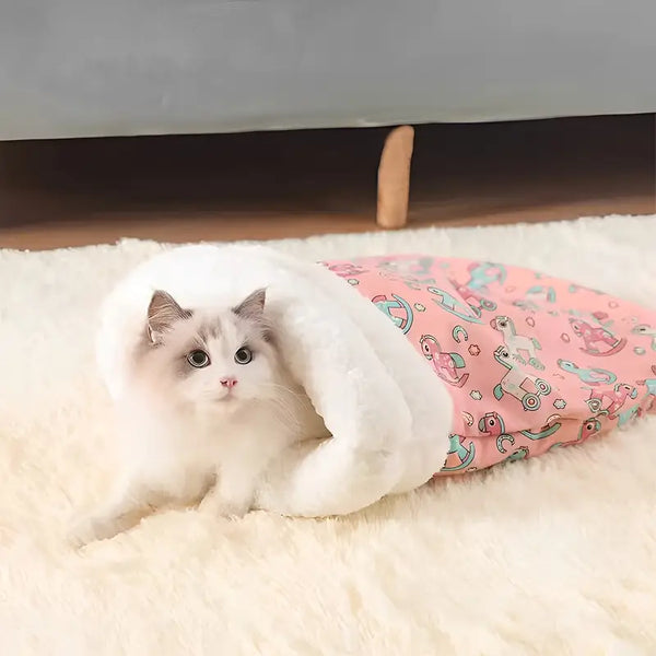 Cat resting inside the plush cat sleeping pouch