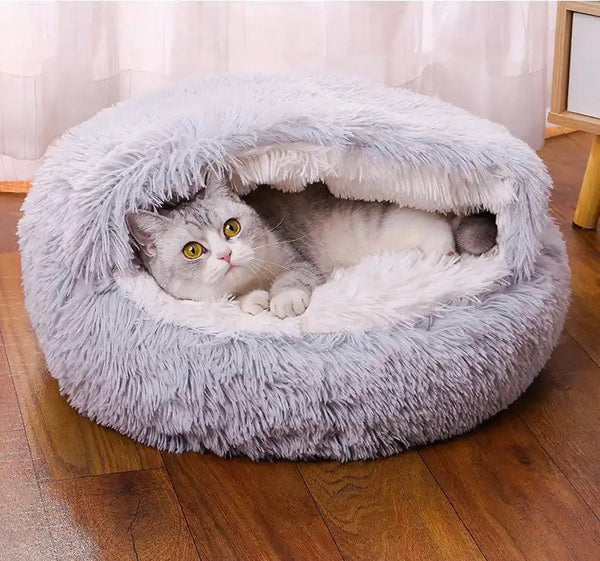 Plush fluffy cat bed shown from above