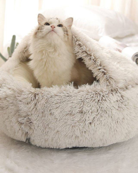 Plush fluffy pet bed with raised rim and hood for cats