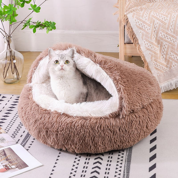 Pet sleeping in the plush fluffy calming bed