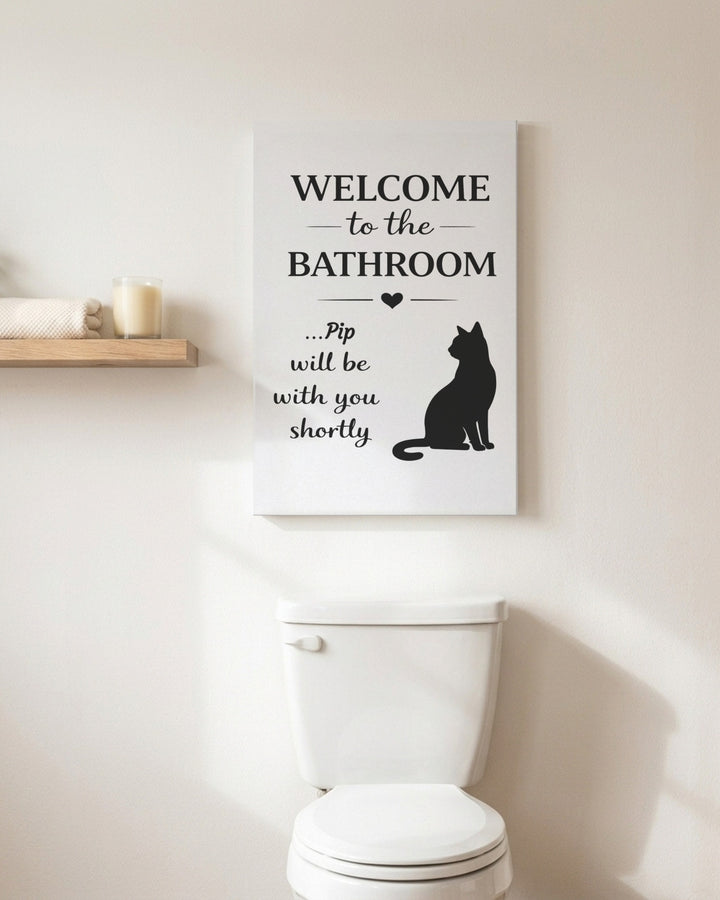 Personalized Welcome to the Bathroom canvas for Pip above a toilet