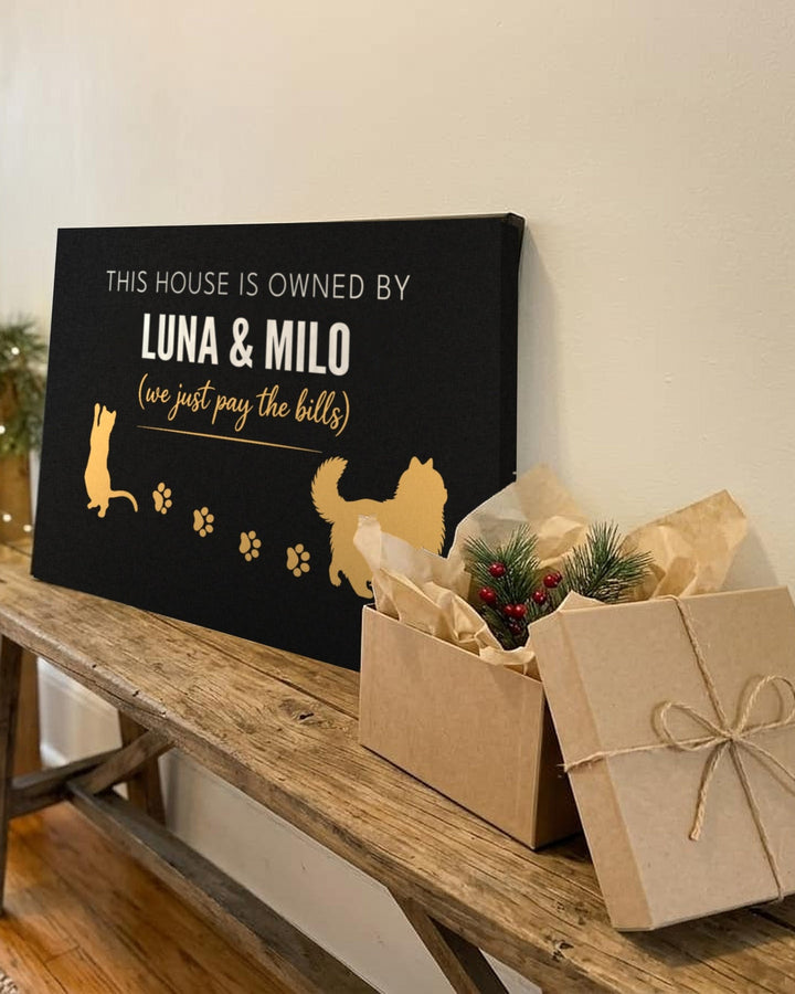 Personalized cat name canvas gift reading This house is owned by Luna & Milo next to a wrapped present