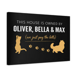 Personalized Owned By Cats canvas, Black & Gold, reading This house is owned by Oliver, Bella & Max, side view showing the gallery-wrapped edge