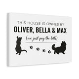 Personalized Owned By Cats canvas, White & Black, reading This house is owned by Oliver, Bella & Max, side view showing the gallery-wrapped edge